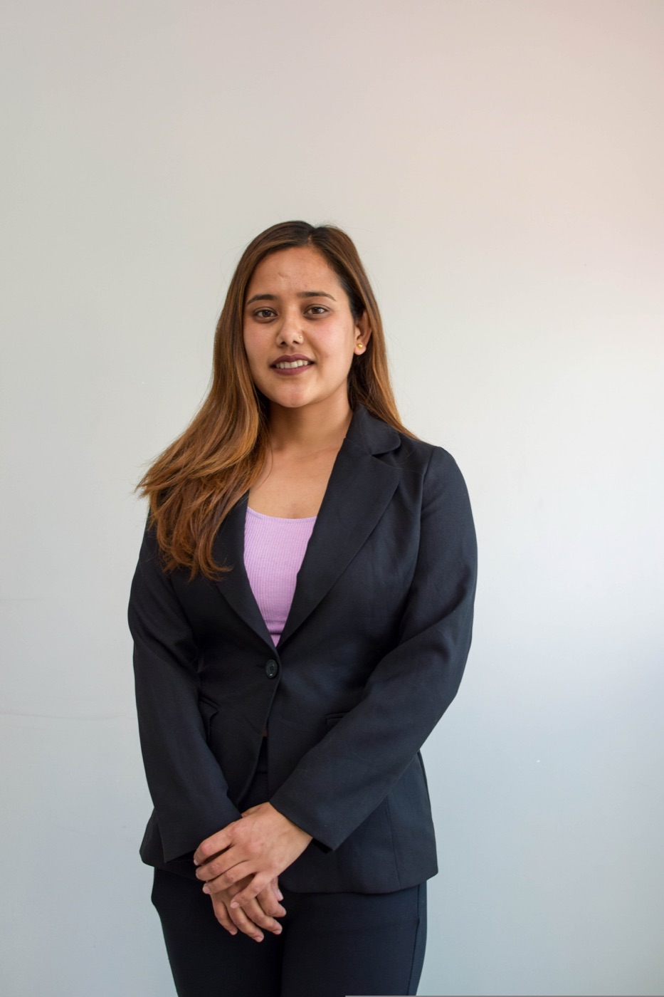 Portrait of a SalesHubNepal team member at the Kathmandu distribution HQ