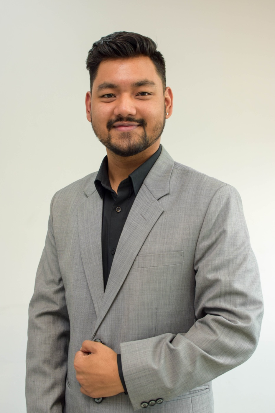 Portrait of a SalesHubNepal team member at the Kathmandu distribution HQ